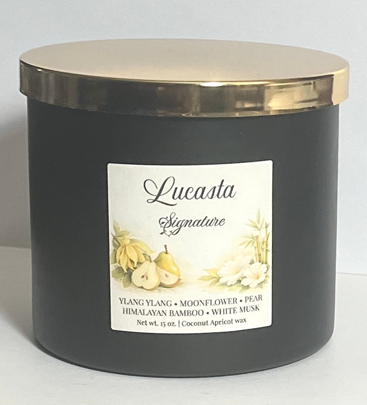 Lucasta Signature candle in black jar with gold lid on a light gray background, coconut soy wax blend