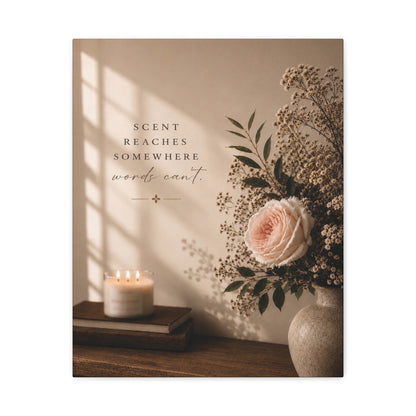 Lucasta Romantic Floral Canvas Art with candle, books, and flowers styled on a wooden surface