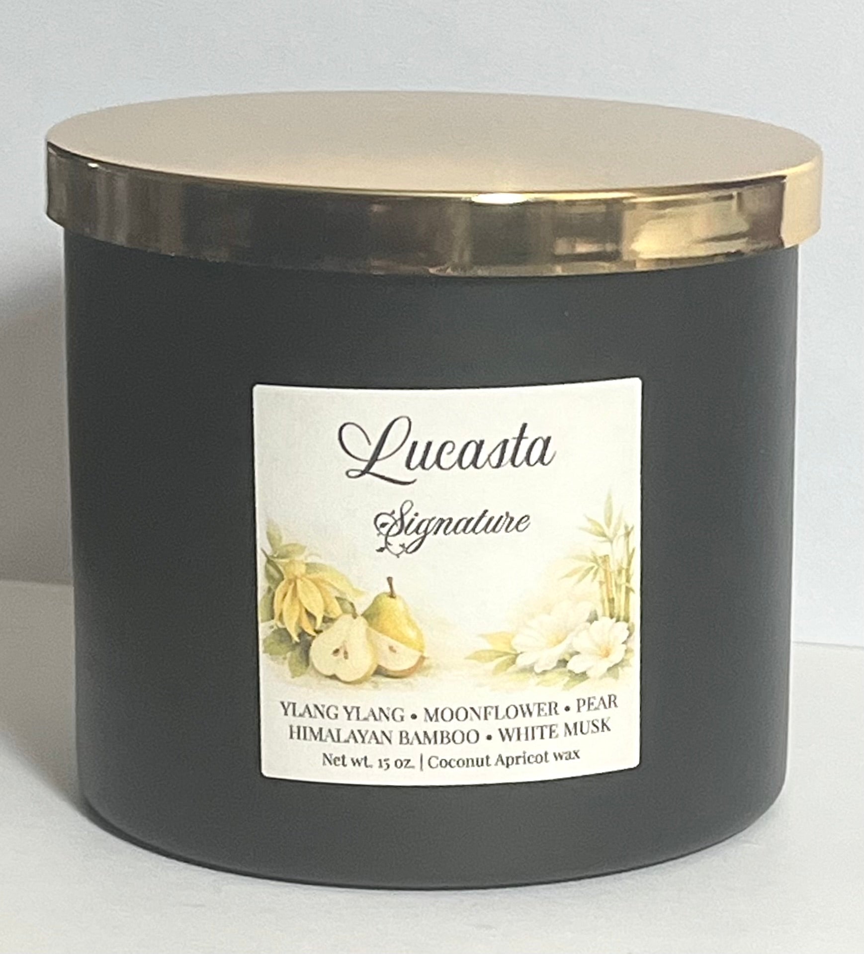 Lucasta Signature candle in black jar with gold lid on a light gray background, coconut soy wax blend