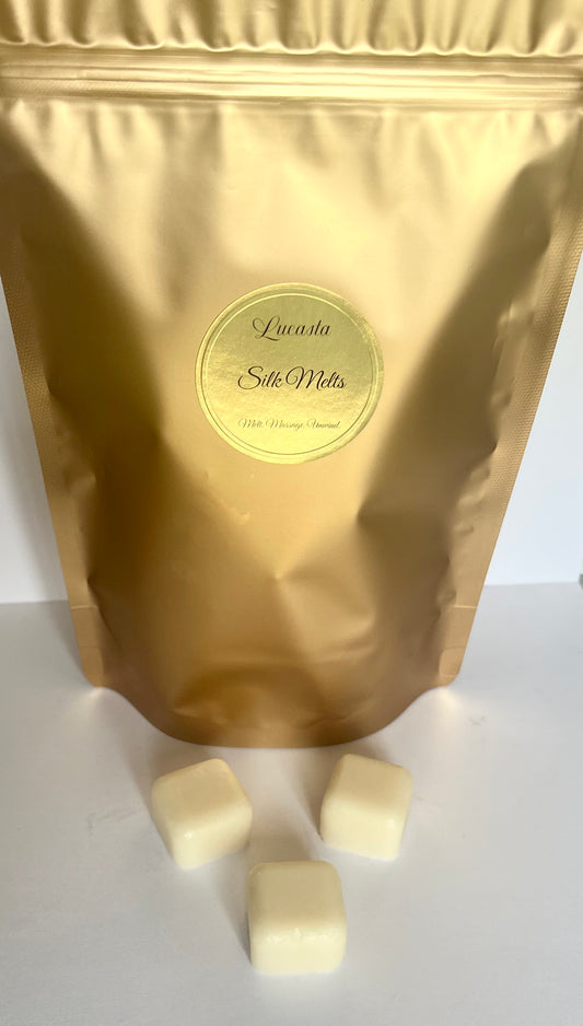 Gold packaging bag with a label and white massage cubes on a white background