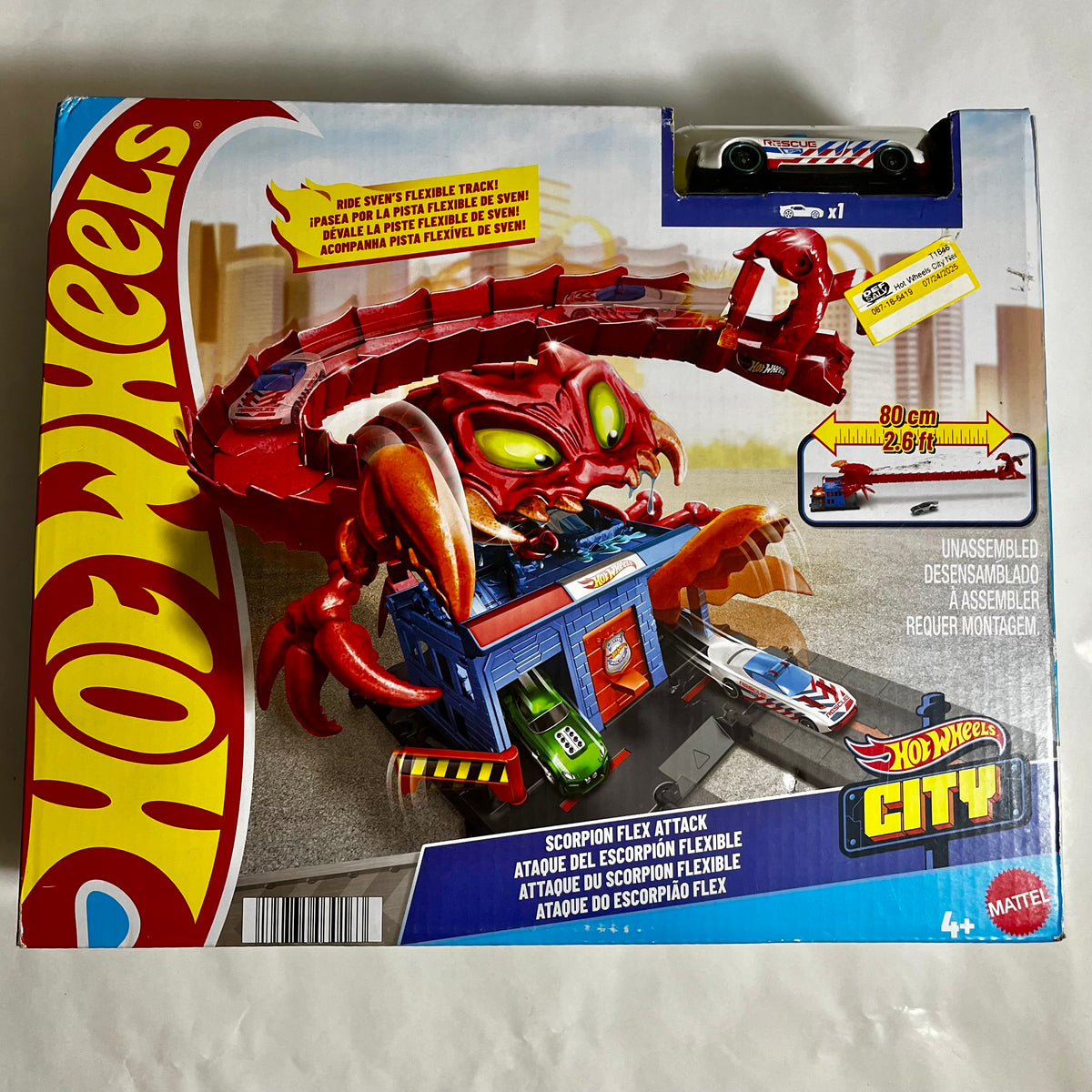 Hot Wheels City Scorpion Flex Attack toy set in its original retail packaging, featuring a red scorpion-themed track and garage playset with a small die-cast car visible on the box.