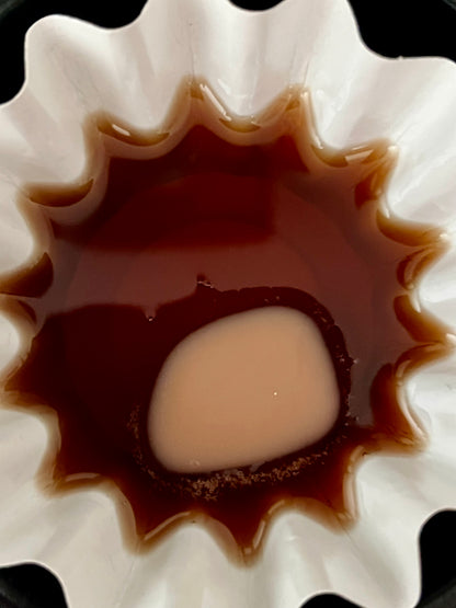 Lucasta Distinguished wax melts melting in a wax warmer dish