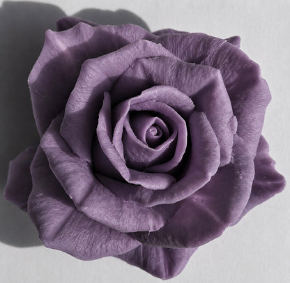 Dusty violet beeswax rose wax melt with a soft matte finish and layered petal detail