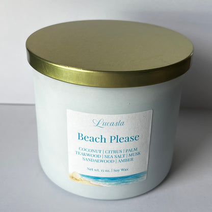 Lucasta Candles Beach Please 15 oz soy candle in a white jar with gold lid, front label view on white background