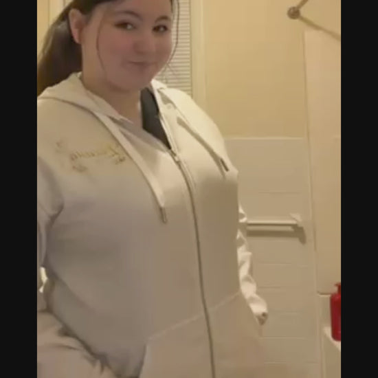 Lucasta Botanical Zip Hoodie lifestyle video showing fit, design detail, and botanical print from front and back